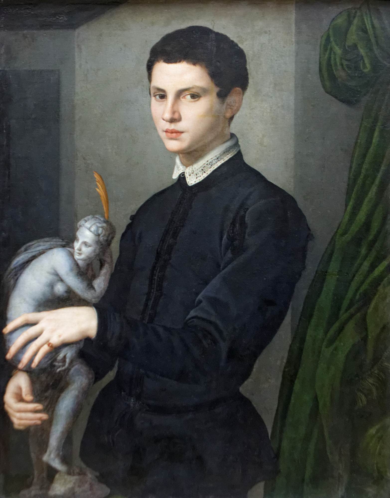 Portrait of a Man Holding a Statuette by BRONZINO, Agnolo