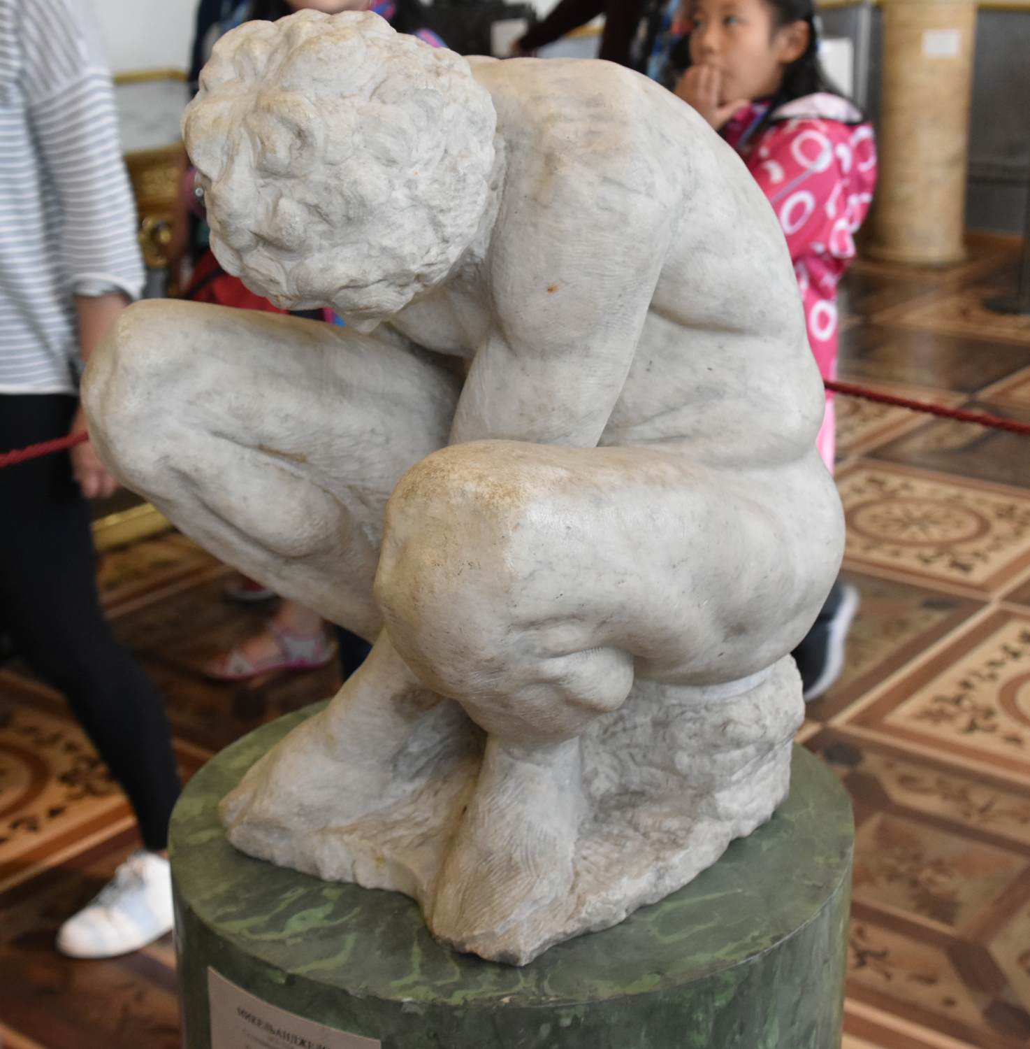 Crouching Boy by MICHELANGELO Buonarroti