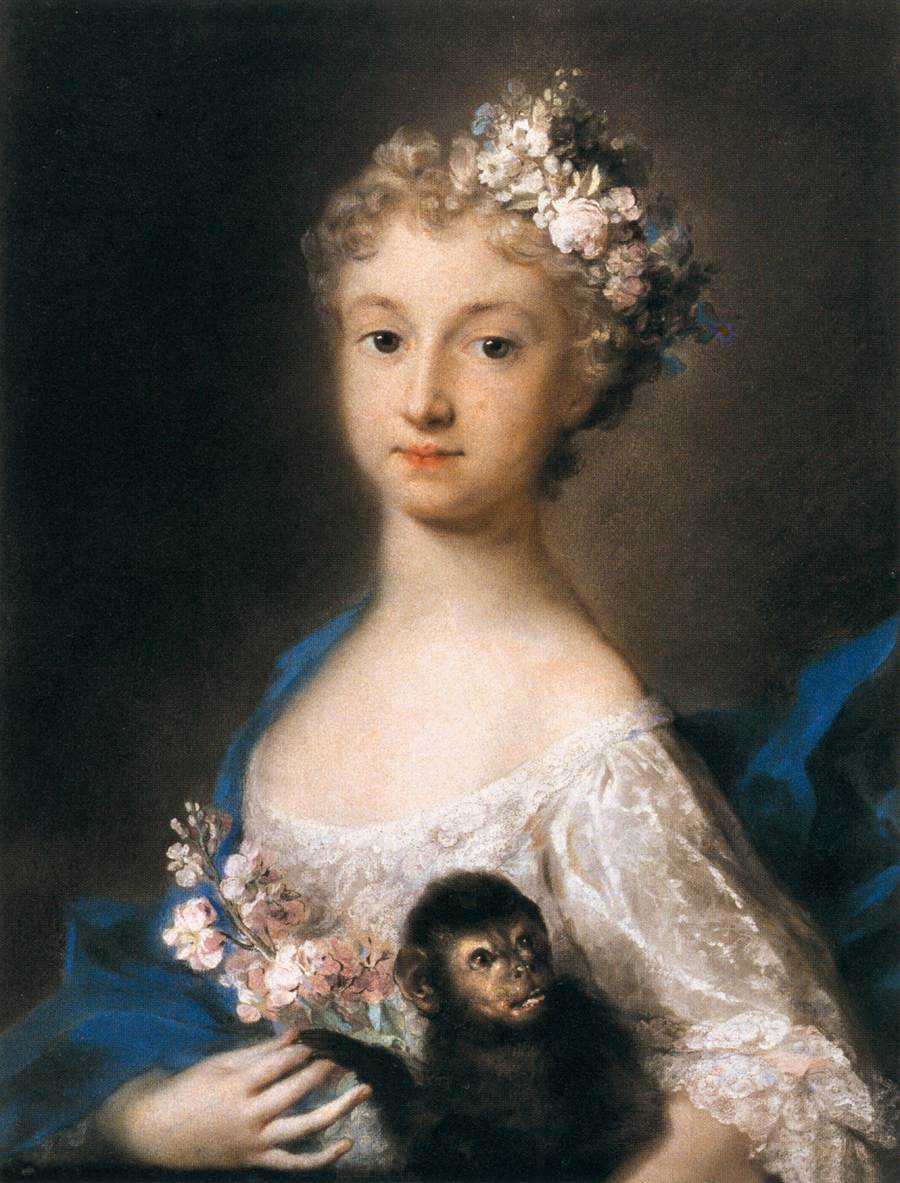 Young Girl Holding a Monkey by